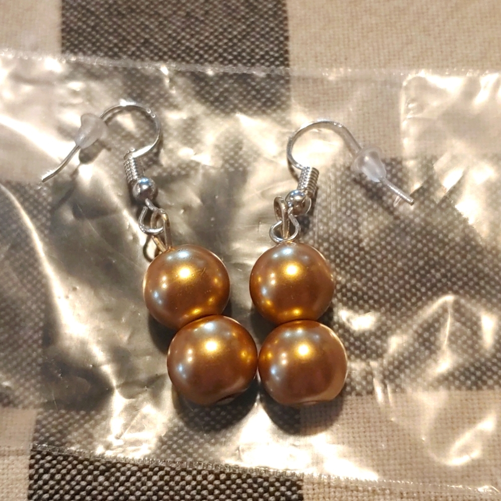 Gold color faux pearl earrings